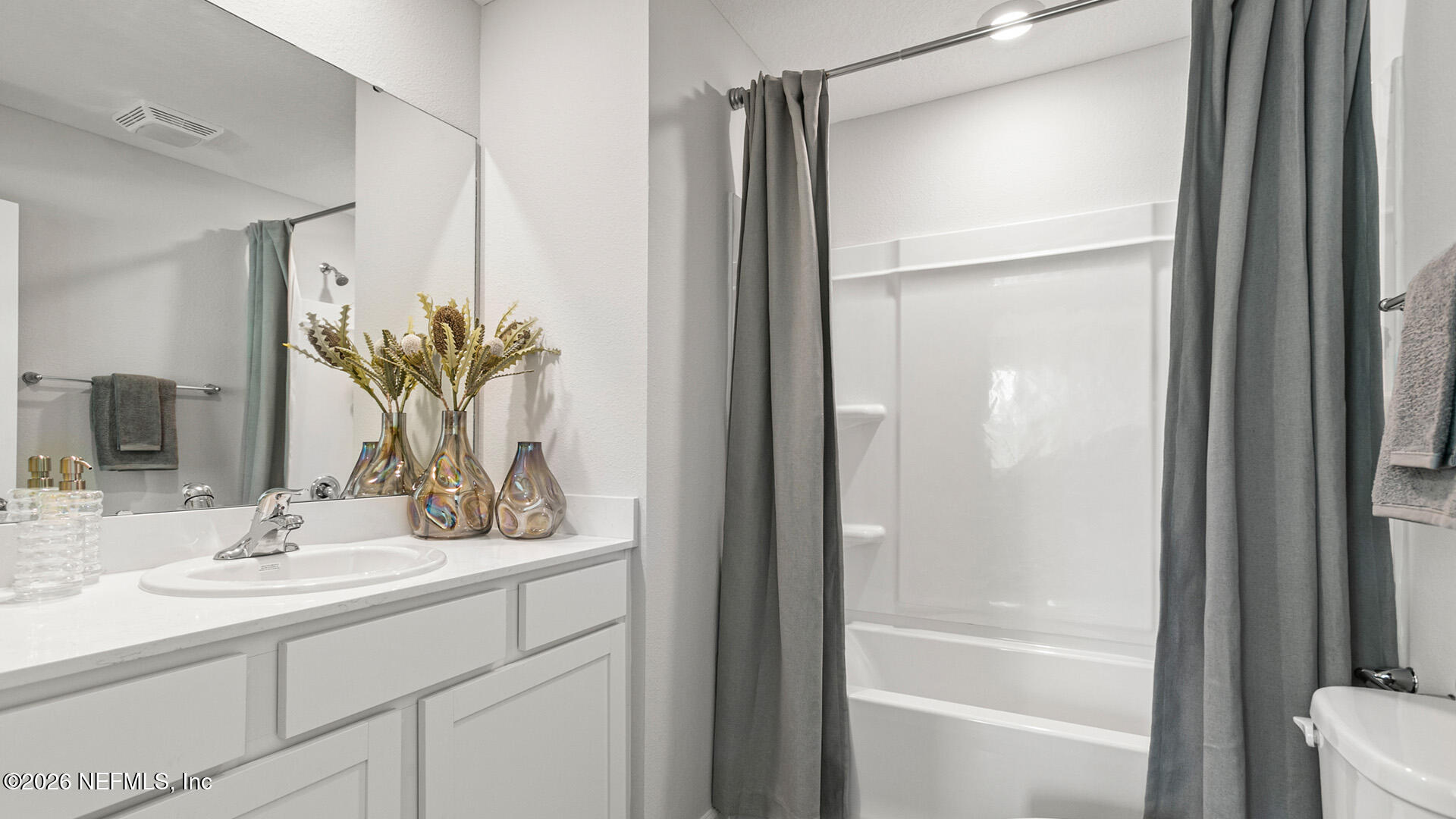 185 Ayamonte Road St. Augustine, FL 32084 - Photo 25 of 37 a bathroom with a sink toilet and shower