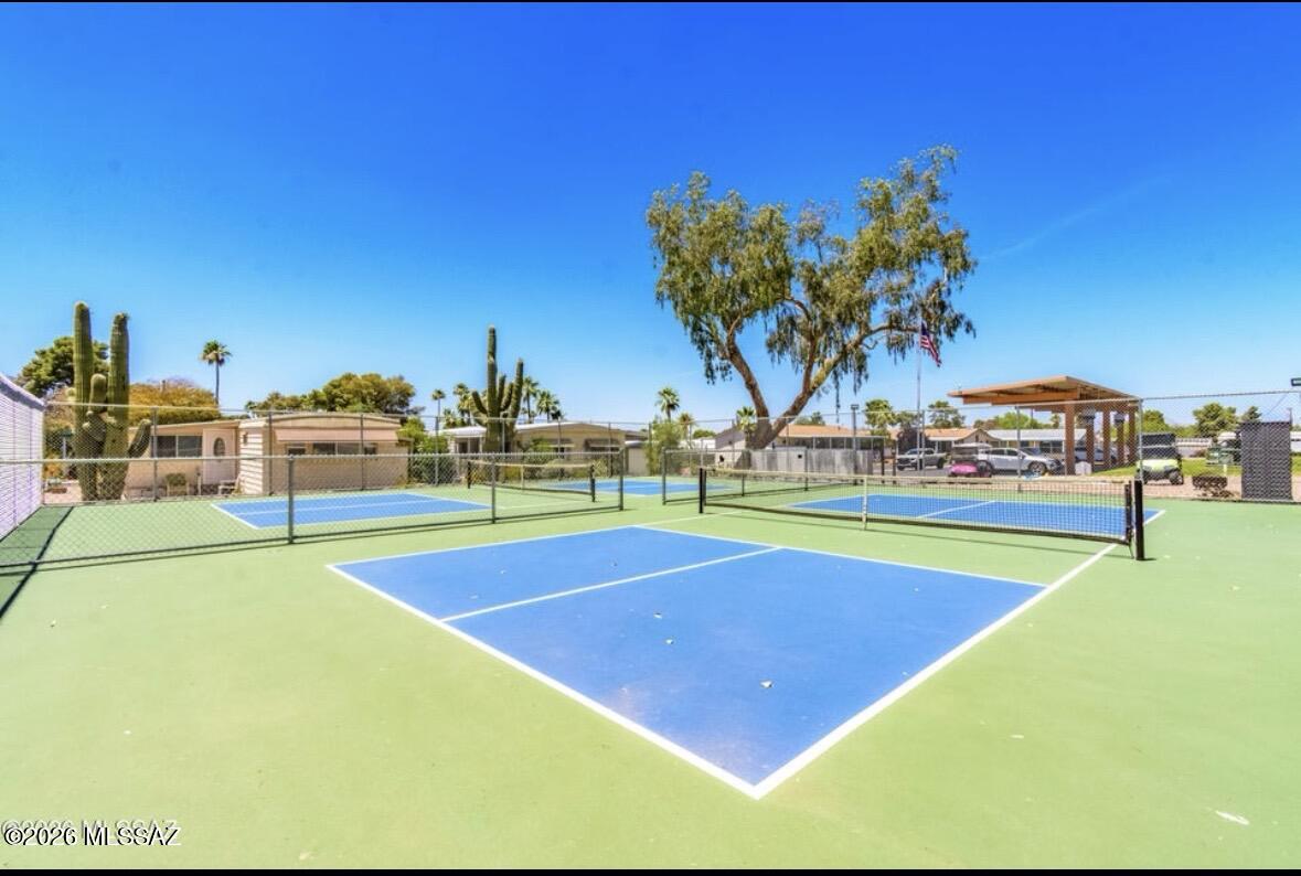 4550 North Flowing Wells Road, Unit 65 Tucson, AZ 85705 - Photo 49 of 50 a view of an outdoor space and basketball court