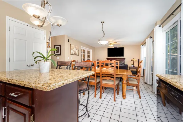 a very nice looking dining room with a table and chairs