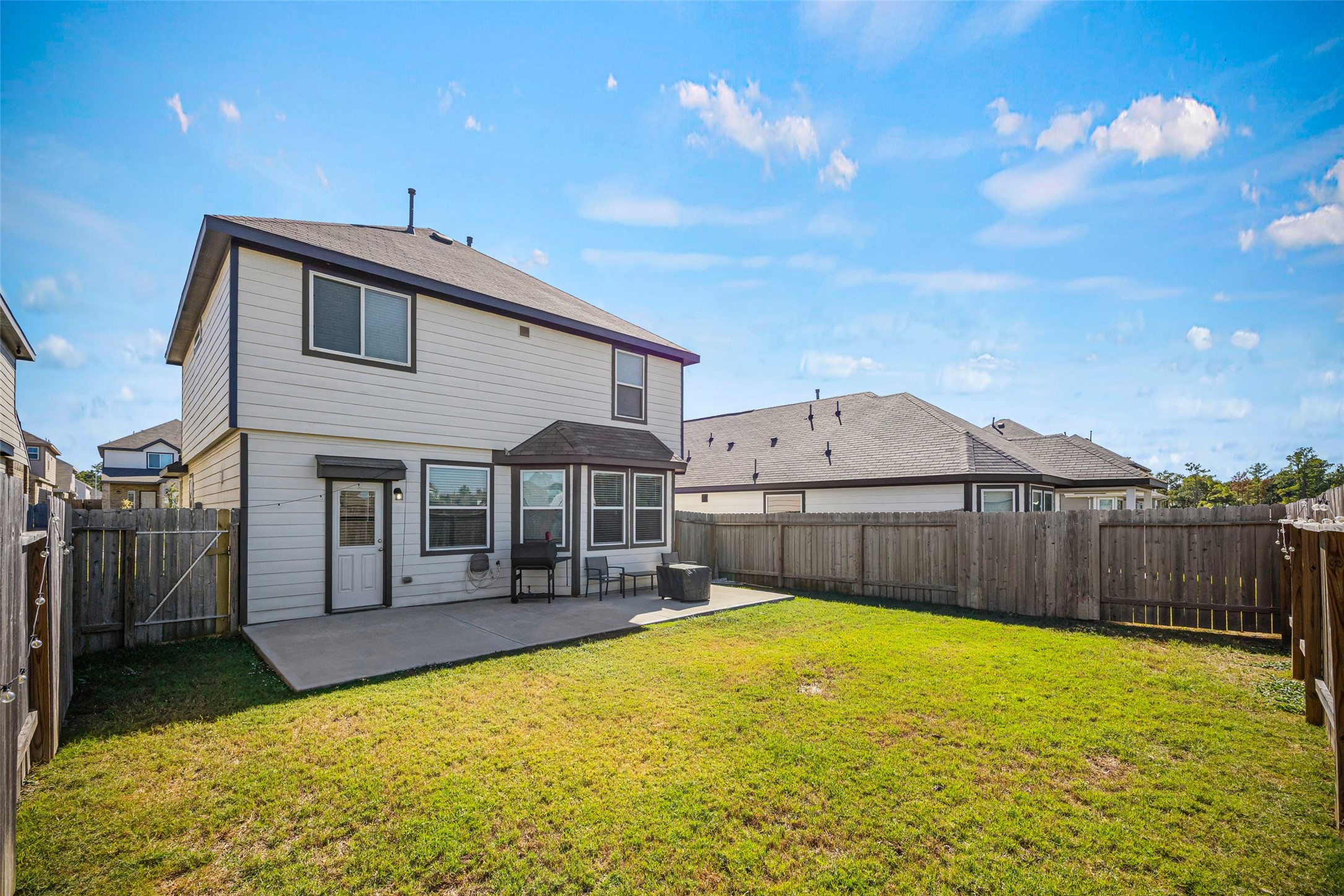 4827 Purple Wisteria Lane Spring, TX 77373 - Photo 25 of 26 a front view of a house with a yard