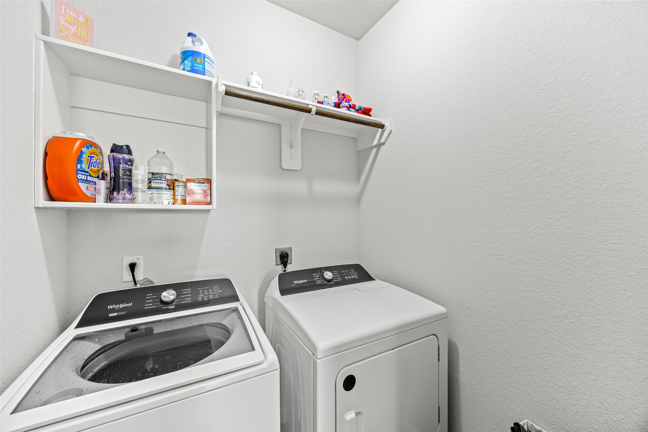 4827 Purple Wisteria Lane Spring, TX 77373 - Photo 9 of 26 a utility room with dryer and washer