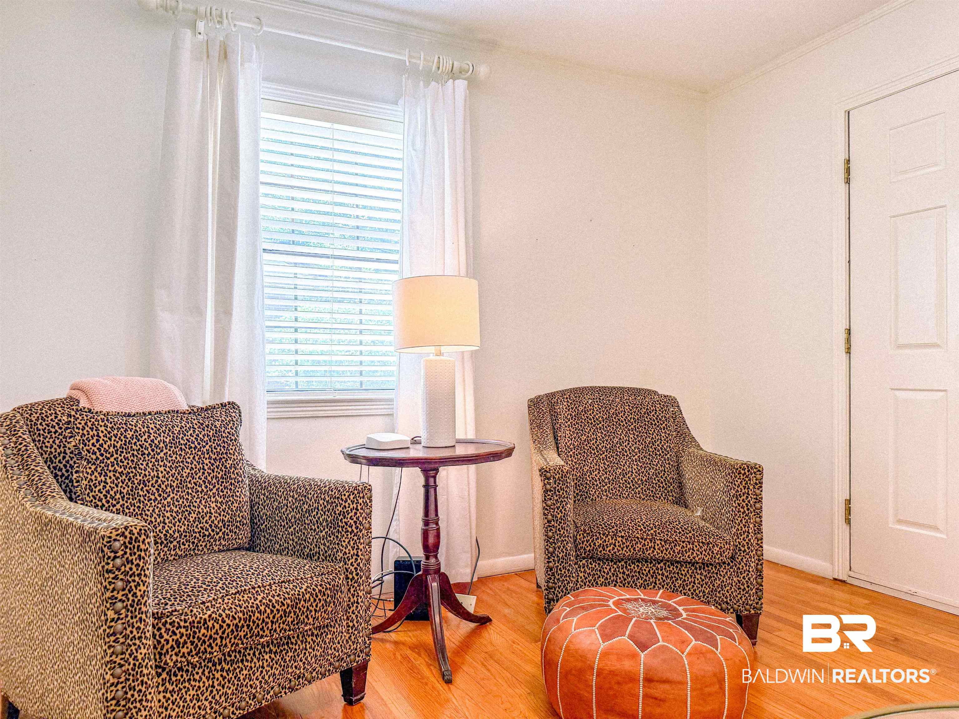 1508 Poplar Avenue Brewton, AL 36426 - Photo 2 of 22 Sitting room with wood finished floors and crown molding