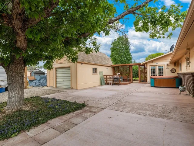 a view of house with outdoor space and tree s