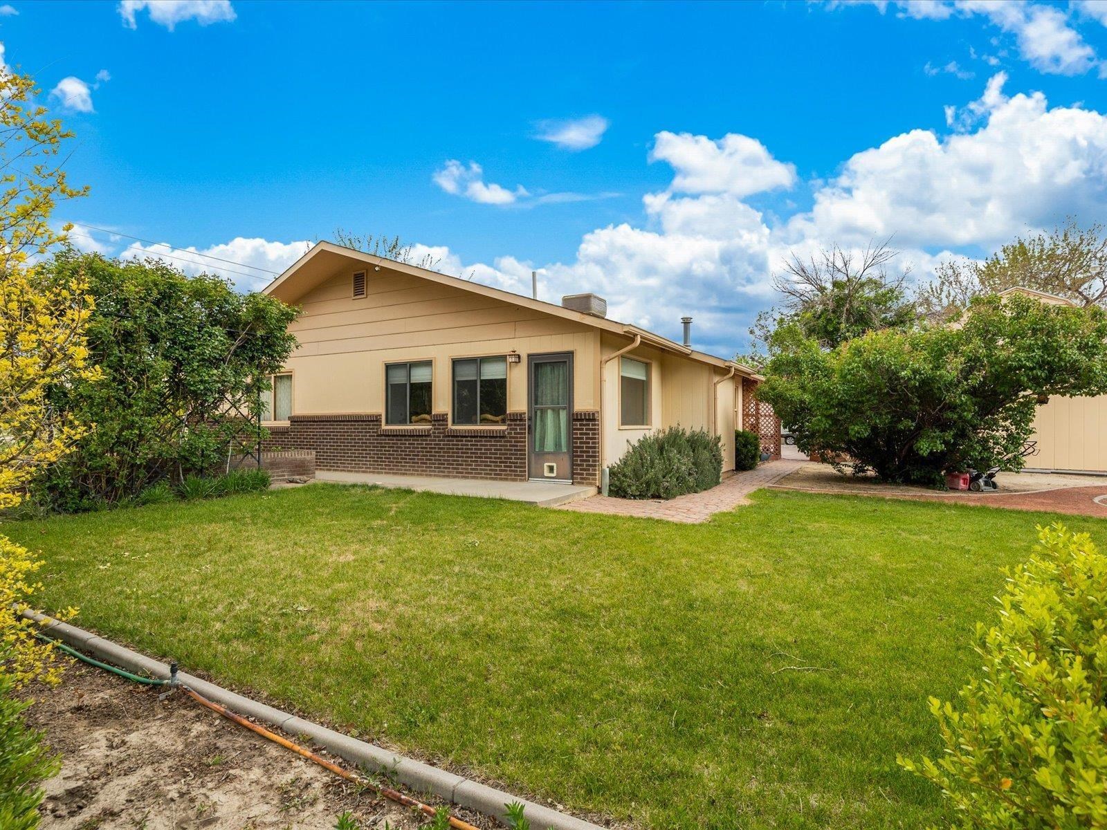 3085 F F 1/2 Road Grand Junction, CO 81504 - Photo 26 of 30 a view of a house with backyard and garden