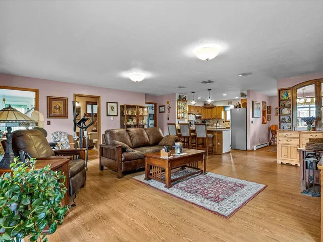 a living room with furniture and a table