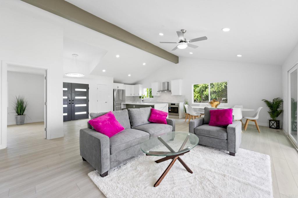 1326 Crestridge Drive Oceanside, CA 92054 - Photo 12 of 29 a living room with furniture kitchen view and a living room view