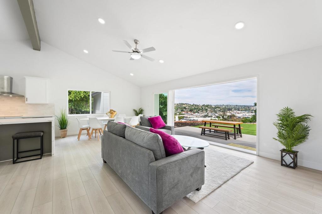 1326 Crestridge Drive Oceanside, CA 92054 - Photo 13 of 29 a living room with furniture and a fireplace