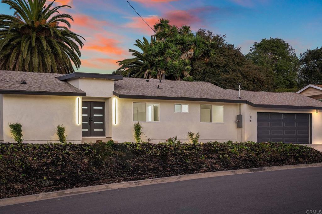 1326 Crestridge Drive Oceanside, CA 92054 - Photo 15 of 29 a front view of house with small garden