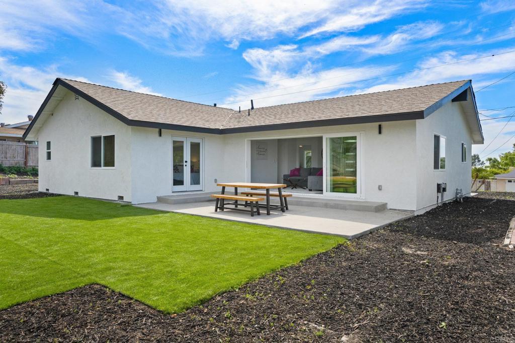 1326 Crestridge Drive Oceanside, CA 92054 - Photo 19 of 29 a view of a house with backyard and sitting area