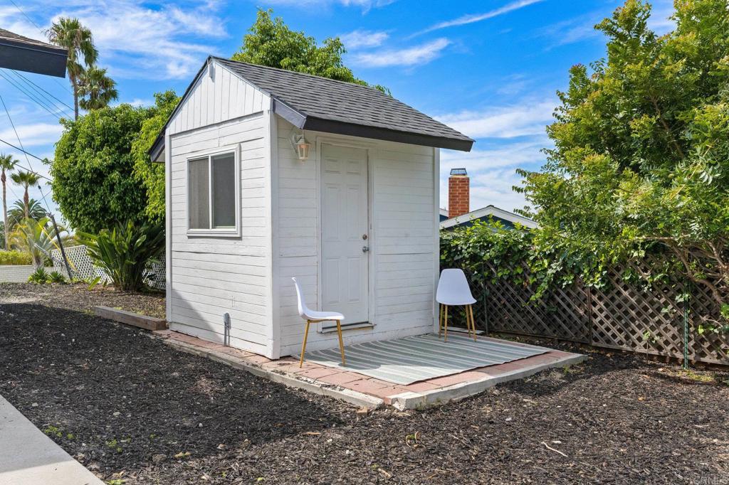 1326 Crestridge Drive Oceanside, CA 92054 - Photo 21 of 29 a front view of a house with a yard