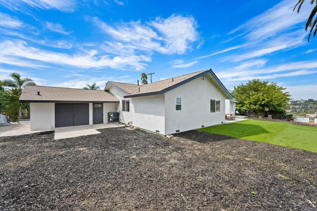 1326 Crestridge Drive Oceanside, CA 92054 - Photo 22 of 29 a view of a house with a yard