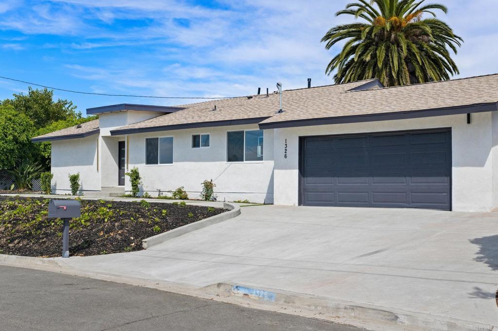 1326 Crestridge Drive Oceanside, CA 92054 - Photo 23 of 29 a front view of house with yard and green space