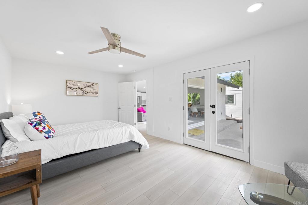 1326 Crestridge Drive Oceanside, CA 92054 - Photo 29 of 29 a bed room with a bed and a couch