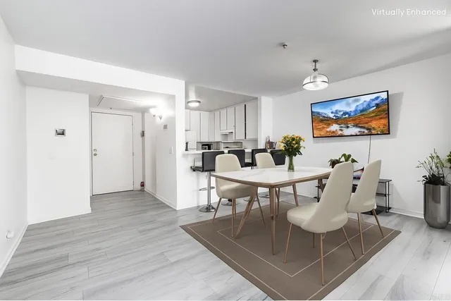 a view of a dining room with furniture