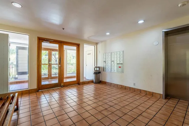 a view of an empty room and window