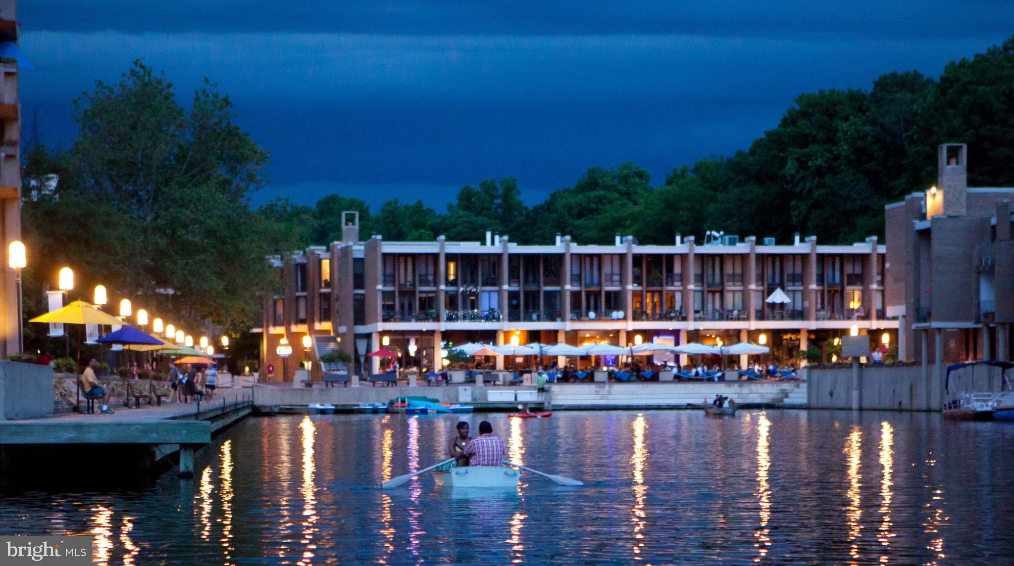 11487 Waterview Cluster Reston, VA 20190 - Photo 40 of 44 a view of swimming pool with outdoor seating