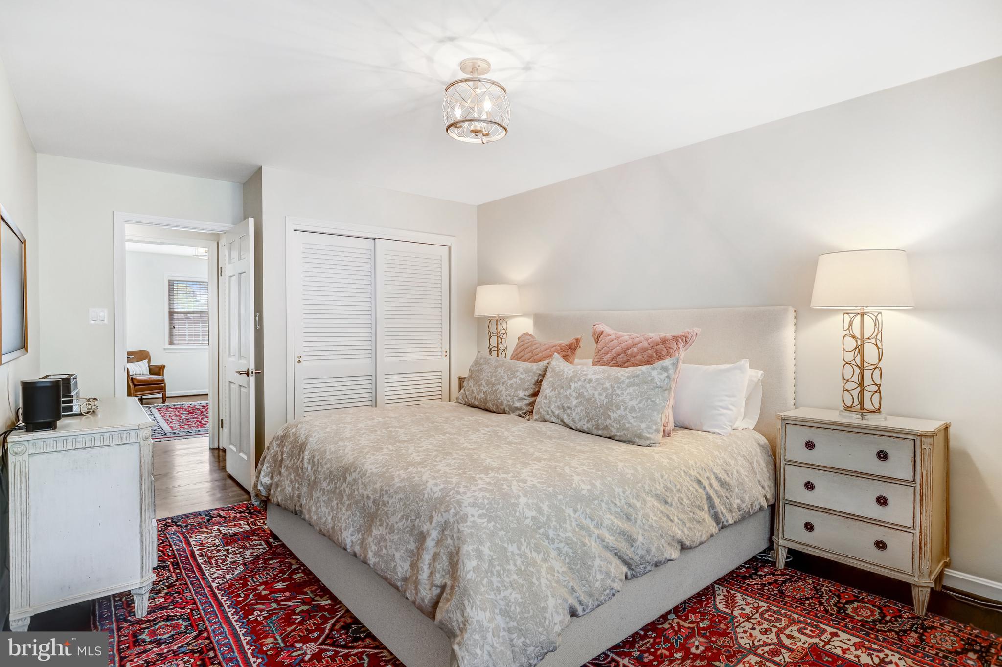 6737 Baron Road McLean, VA 22101 - Photo 16 of 36 a bedroom with a bed and a dresser