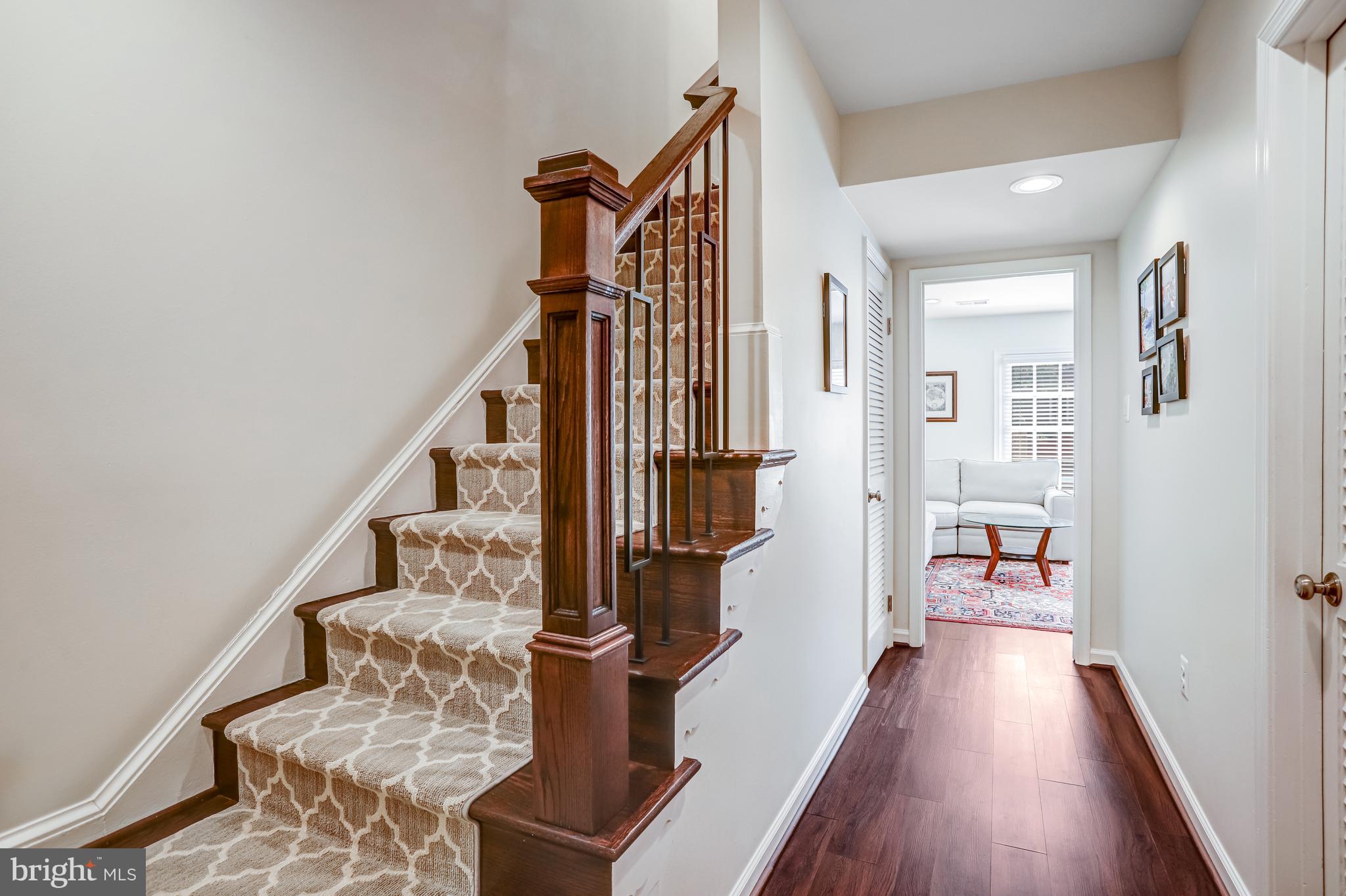 6737 Baron Road McLean, VA 22101 - Photo 23 of 36 a view of hallway with wooden floor and stairs