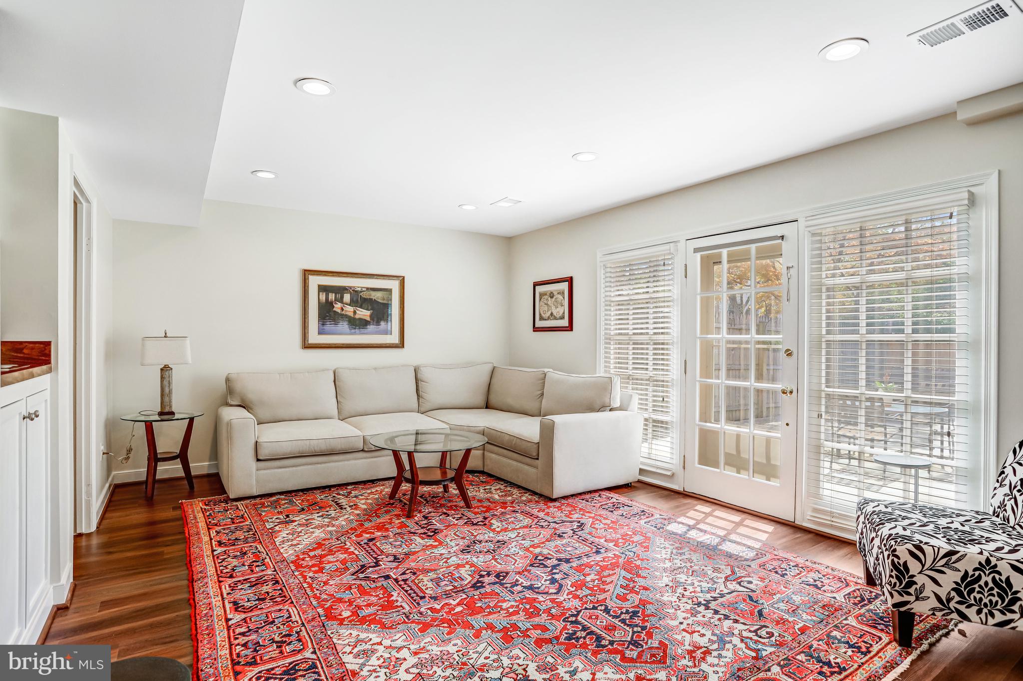 6737 Baron Road McLean, VA 22101 - Photo 29 of 36 a living room with furniture and a rug