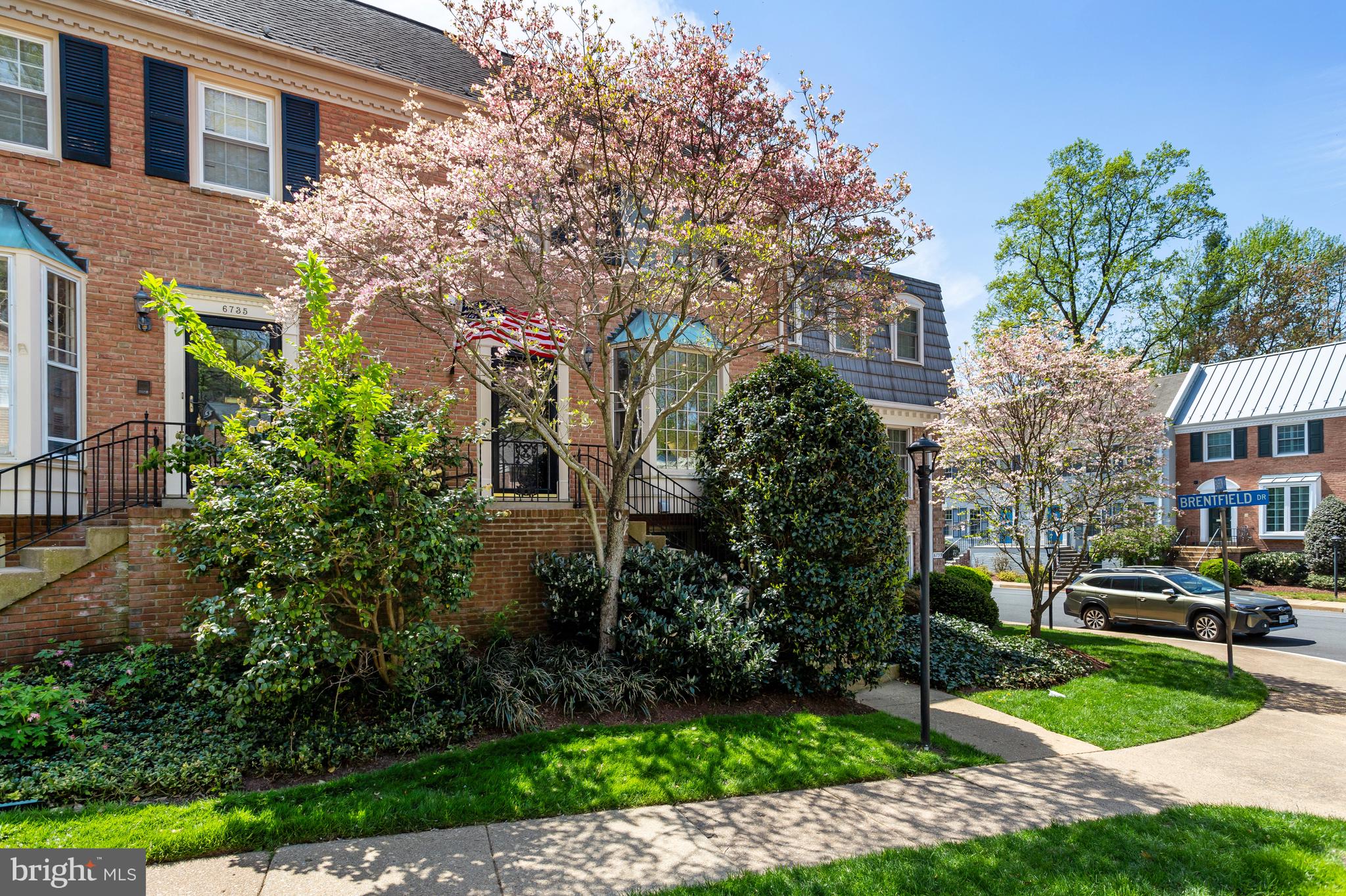6737 Baron Road McLean, VA 22101 - Photo 3 of 36 a front view of a residential houses with yard and green space