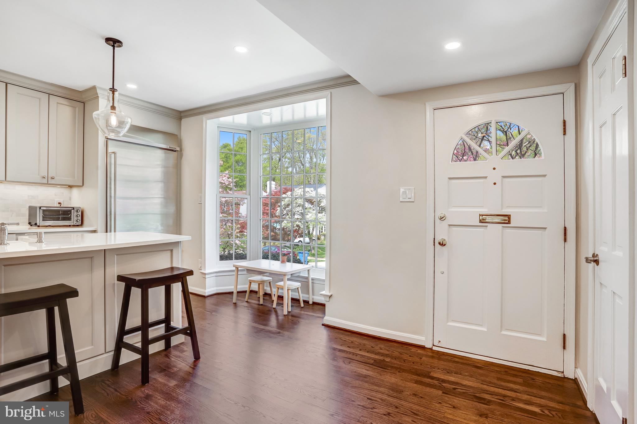 6737 Baron Road McLean, VA 22101 - Photo 4 of 36 a view of a livingroom with furniture window and wooden floor