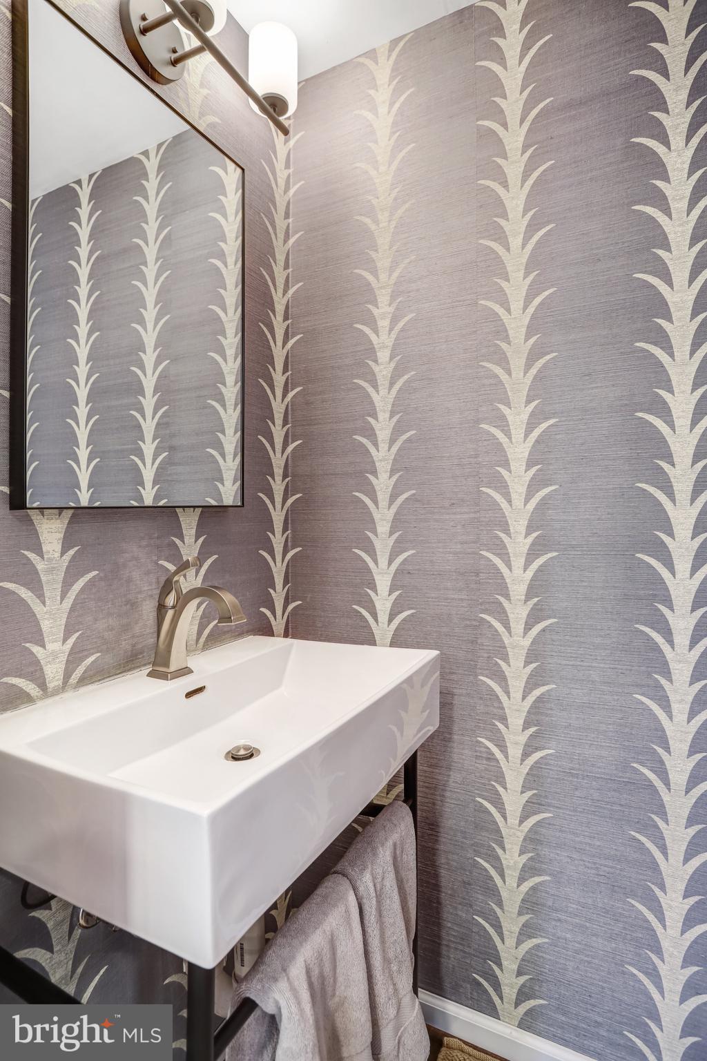 6737 Baron Road McLean, VA 22101 - Photo 5 of 36 a bathroom with a sink and mirror