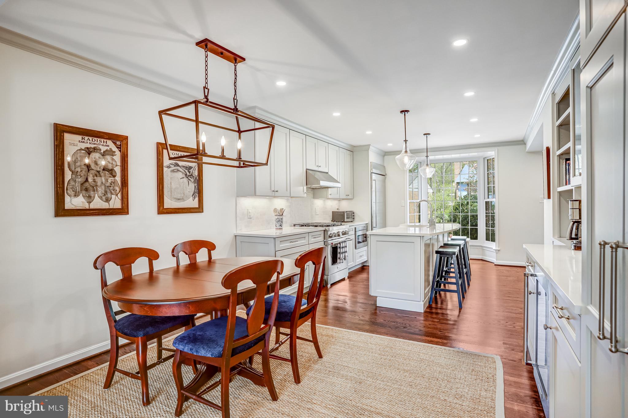 6737 Baron Road McLean, VA 22101 - Photo 10 of 36 a view of a dining room with furniture window and wooden floor