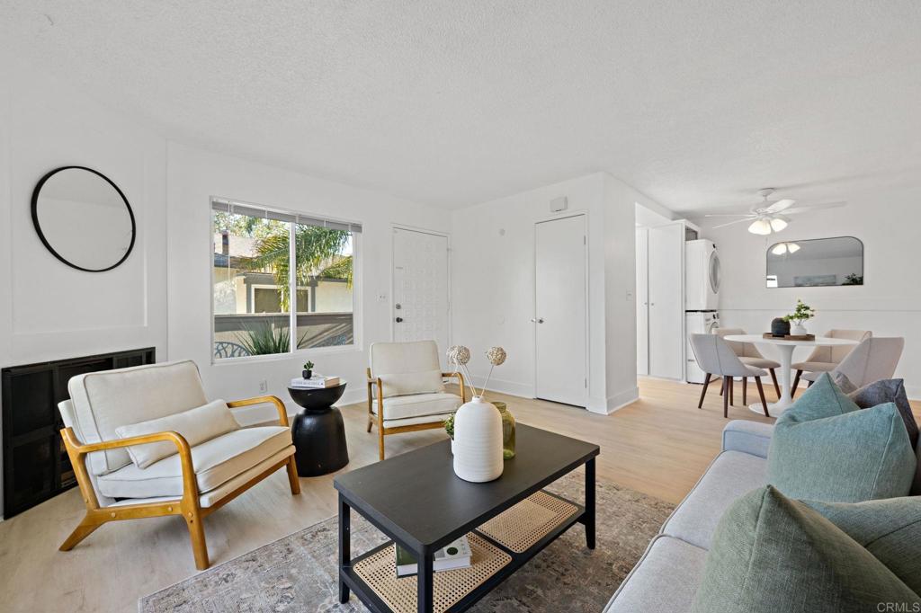 3408 Del Este Way Oceanside, CA 92056 - Photo 3 of 25 a living room with furniture a table and a dining table