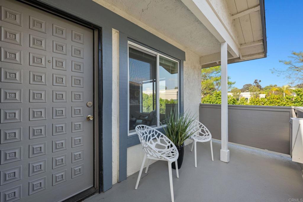 3408 Del Este Way Oceanside, CA 92056 - Photo 5 of 25 a view of a chairs and table in a balcony