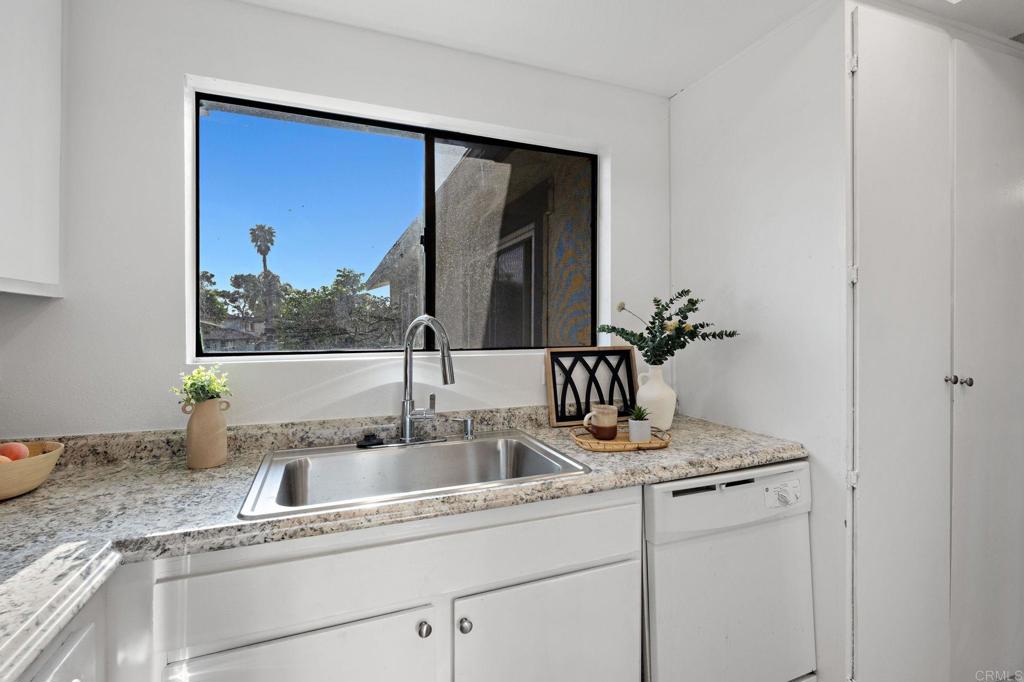 3408 Del Este Way Oceanside, CA 92056 - Photo 9 of 25 a bathroom with a sink and a mirror