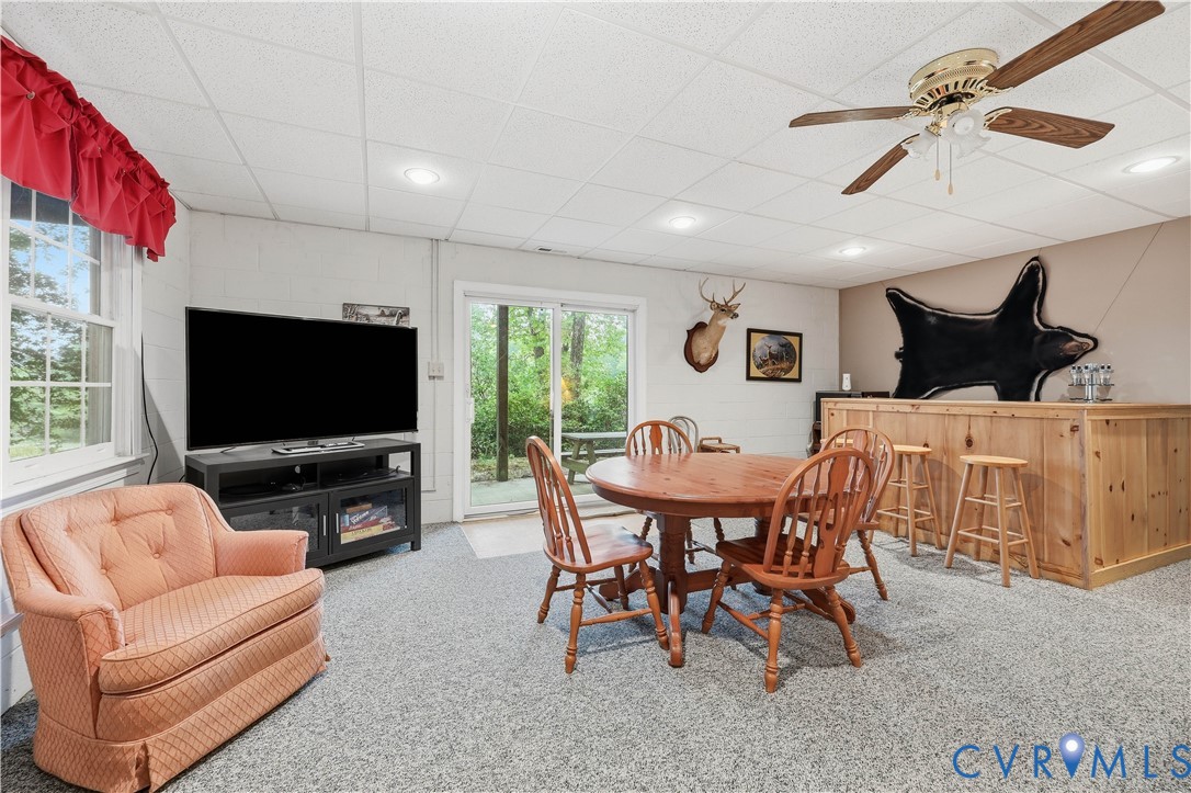 471 Knights Run Road Heathsville, VA 22473 - Photo 27 of 36 Carpeted lower-level room featuring a built-in woo
