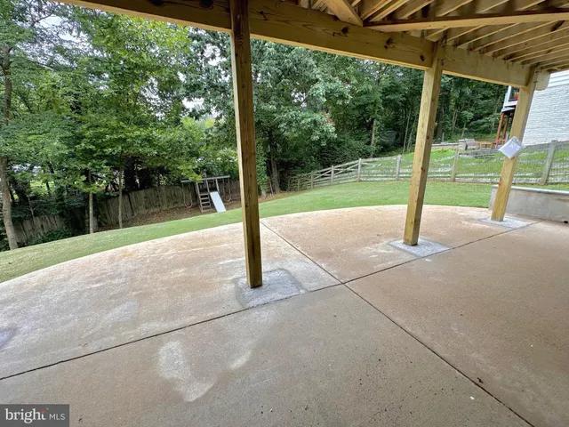 a house view with a backyard space