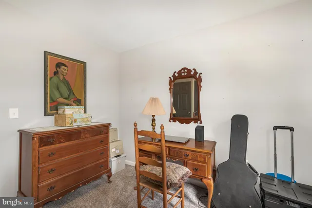 a view of a workspace with furniture