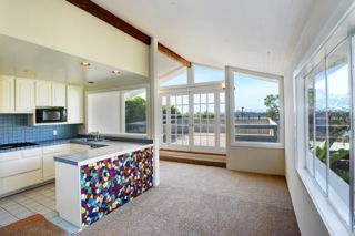 764 Moreno Road Santa Barbara, CA 93103 - Photo 4 of 18 a living room with a large window and furniture