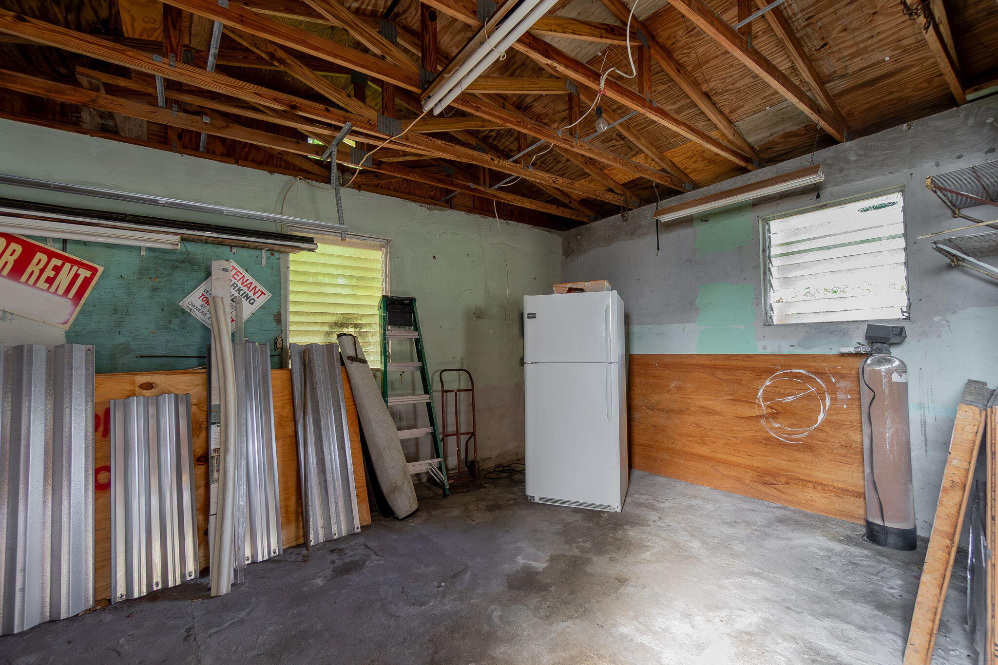 5519 Southeast Normandy Avenue Stuart, FL 34997 - Photo 34 of 37 Interior Workshop/panel shutters