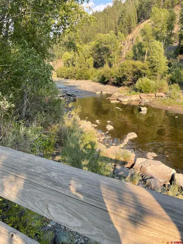 a view of a lake from a yard
