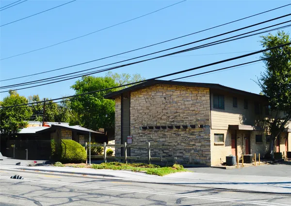 a view of outdoor space and front view of a house