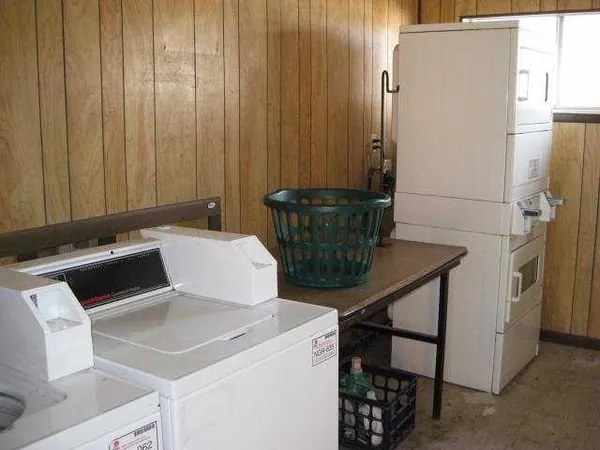 a view of a house with a flower garden