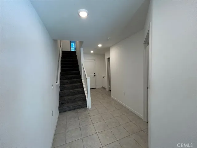 a view of an entryway with stairs