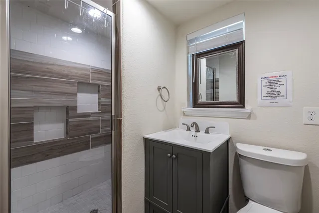 a bathroom with a sink and a toilet