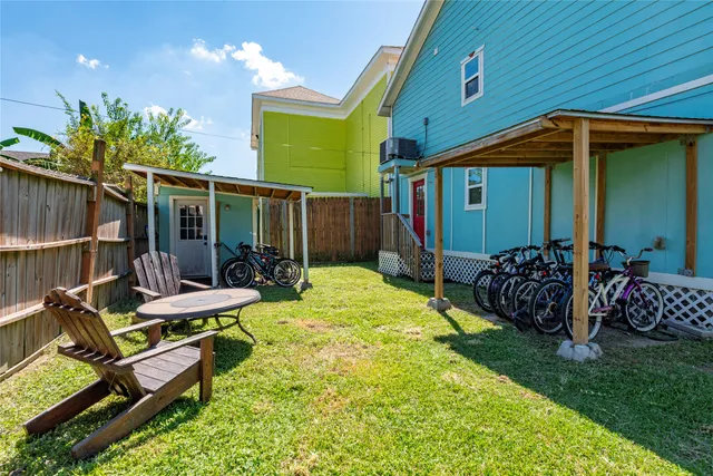 a view of backyard with cabin