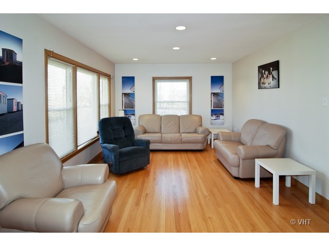 575 Byrd Road Riverside, IL 60546 - Photo 2 of 9 a living room with furniture and a wooden floor