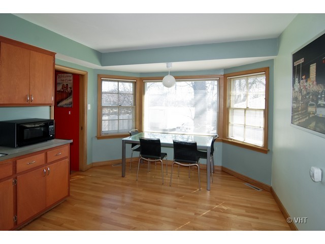 575 Byrd Road Riverside, IL 60546 - Photo 4 of 9 a living room with furniture and large windows