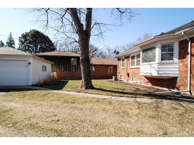 575 Byrd Road Riverside, IL 60546 - Photo 9 of 9 a house view with a backyard space
