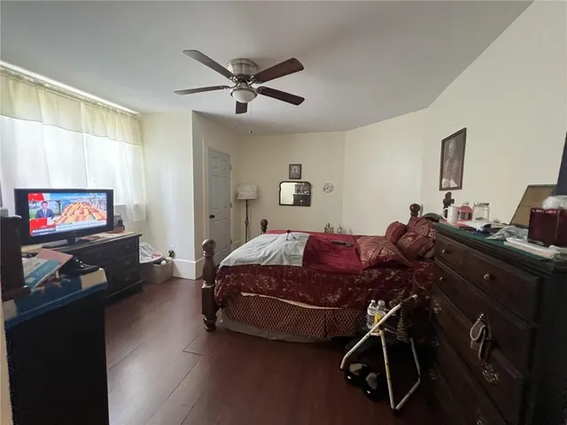 a bed room with furniture and a window