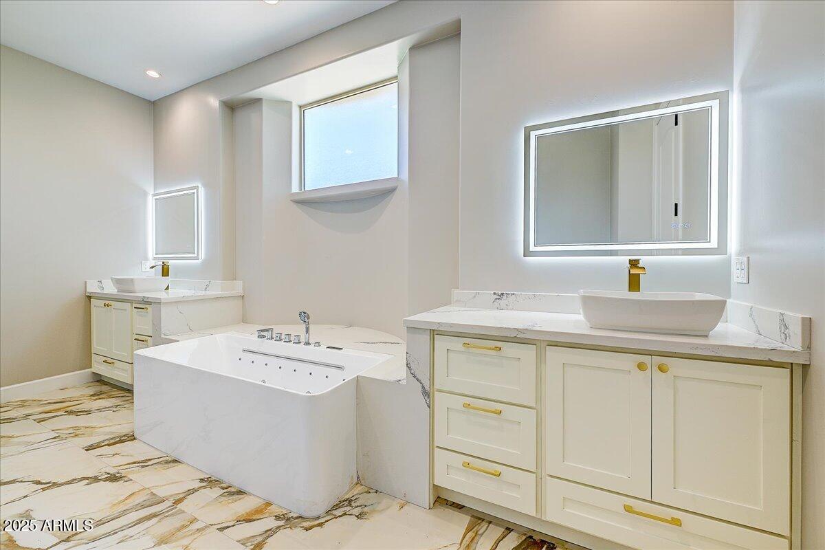 27730 North 35th Avenue Phoenix, AZ 85083 - Photo 11 of 37 a bathroom with a sink and a mirror