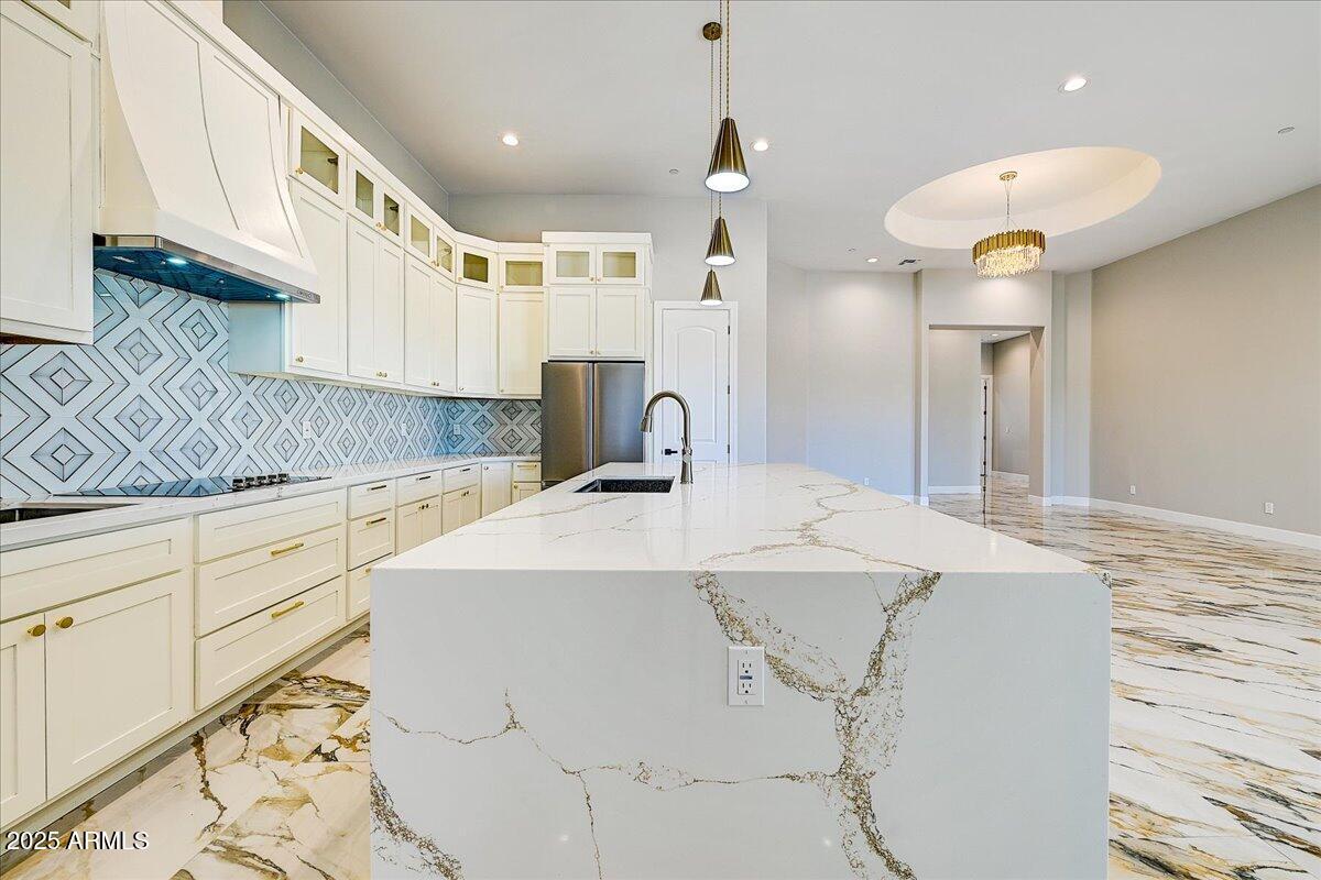 27730 North 35th Avenue Phoenix, AZ 85083 - Photo 22 of 37 a kitchen with granite countertop a sink cabinets and stainless steel appliances
