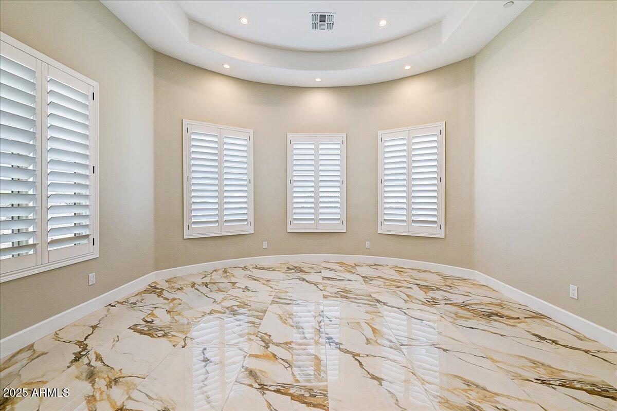 27730 North 35th Avenue Phoenix, AZ 85083 - Photo 24 of 37 a view of a bedroom with a bed and a window