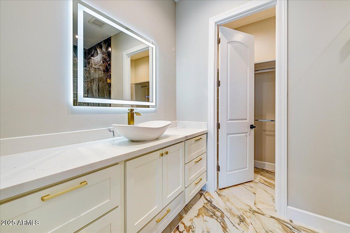 27730 North 35th Avenue Phoenix, AZ 85083 - Photo 26 of 37 a bathroom with a sink and a mirror