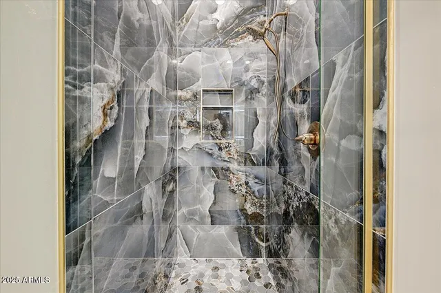 a room with a bed and a cabinets